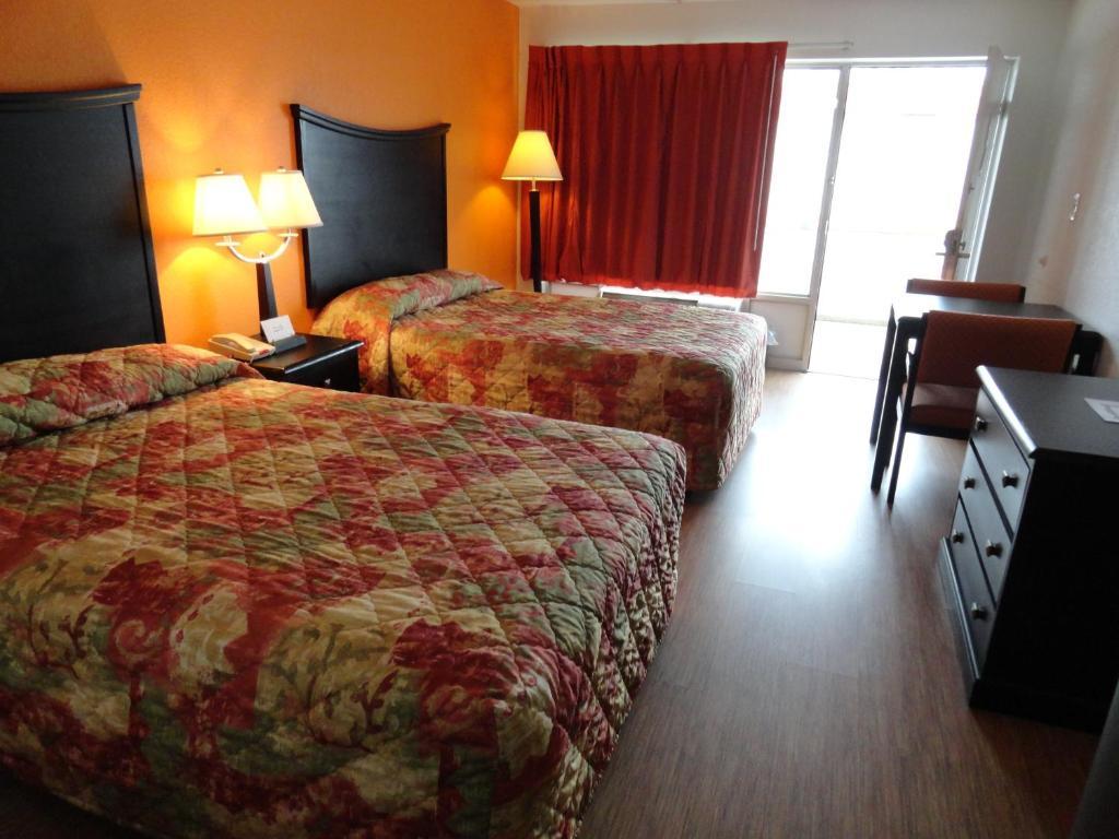 Econo Lodge Metropolis Habitación foto